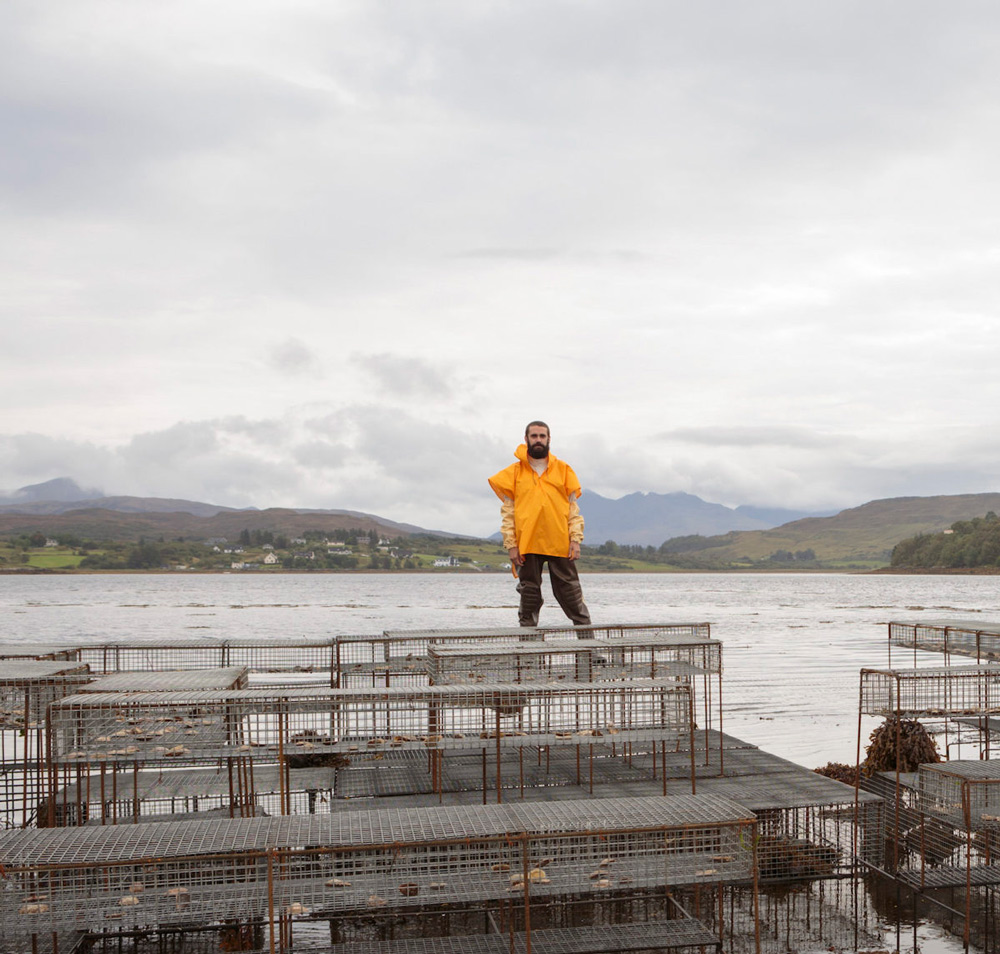 Daniel Fernández Pascual stands by the water.